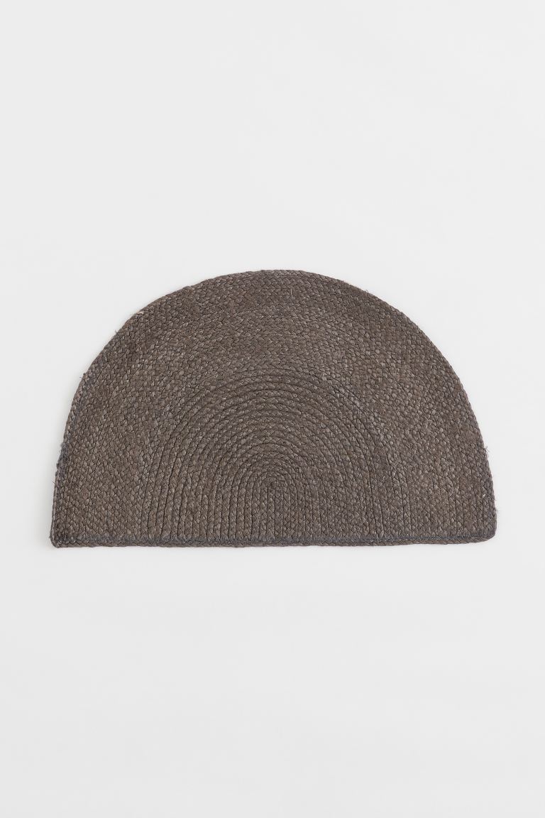 Gray semicircle jute rug from H&M Home.