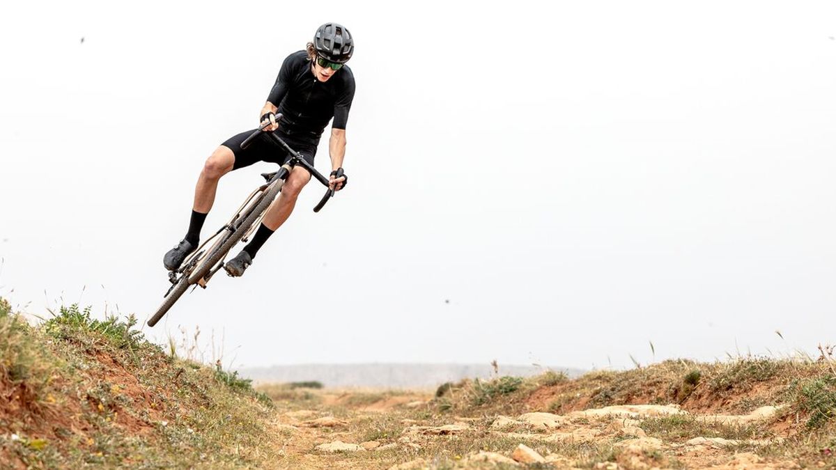 New Pinarello Grevil being jumped off the side of a gravel track