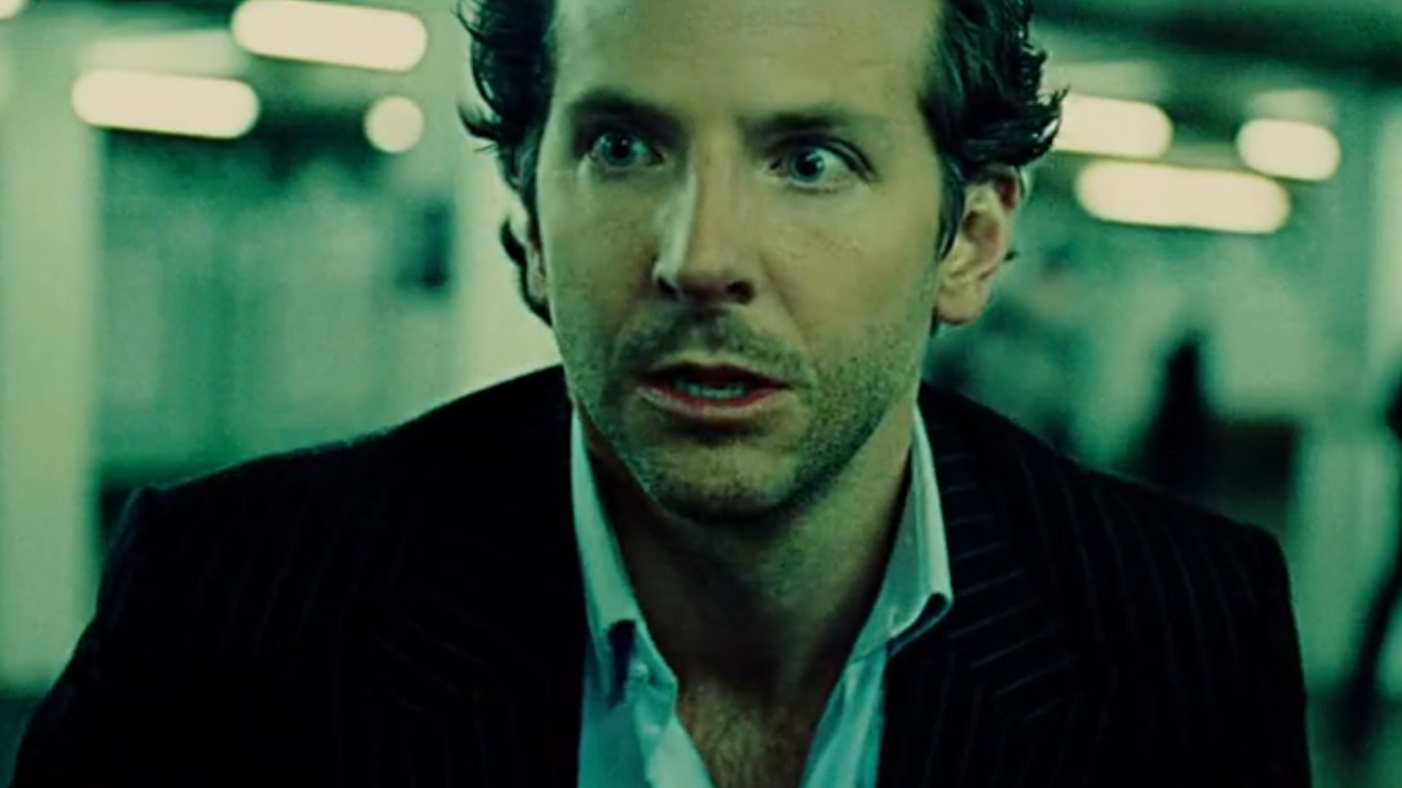 Bradley Cooper looking confused and scared in Limitless