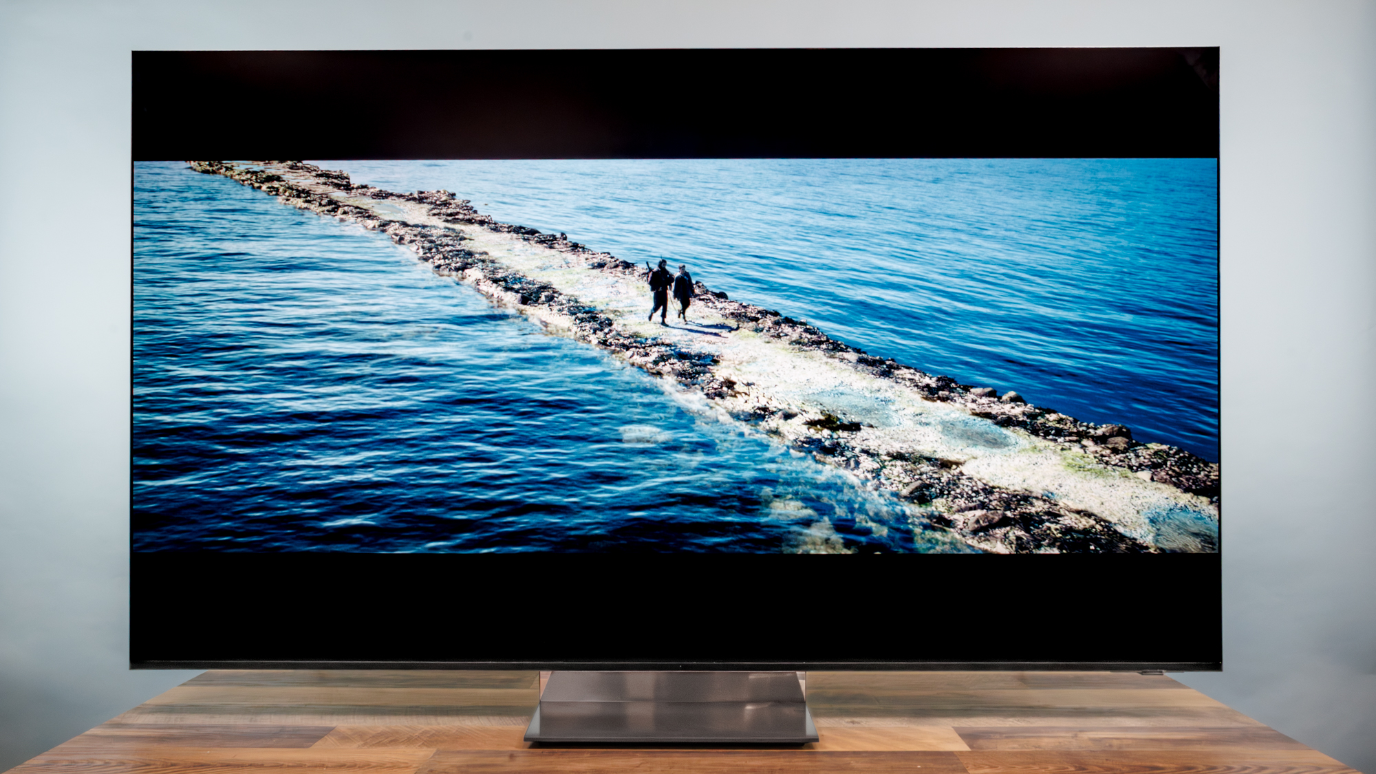 A Samsung R95H Micro RGB TV on a desk