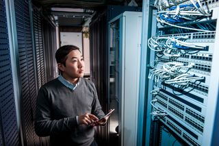 A man maintaining servers