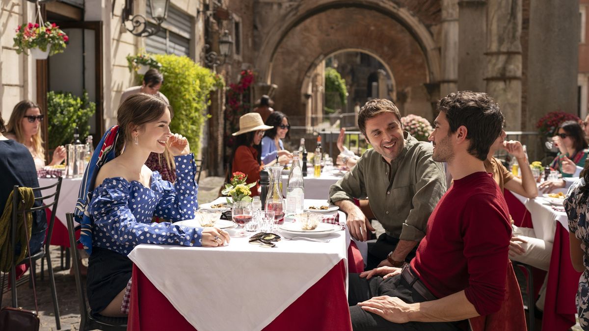 Lily Collins as Emily, Flavio Furno as Gianni, Eugenio Franceschini as Marcello in episode 409 of Emily in Paris