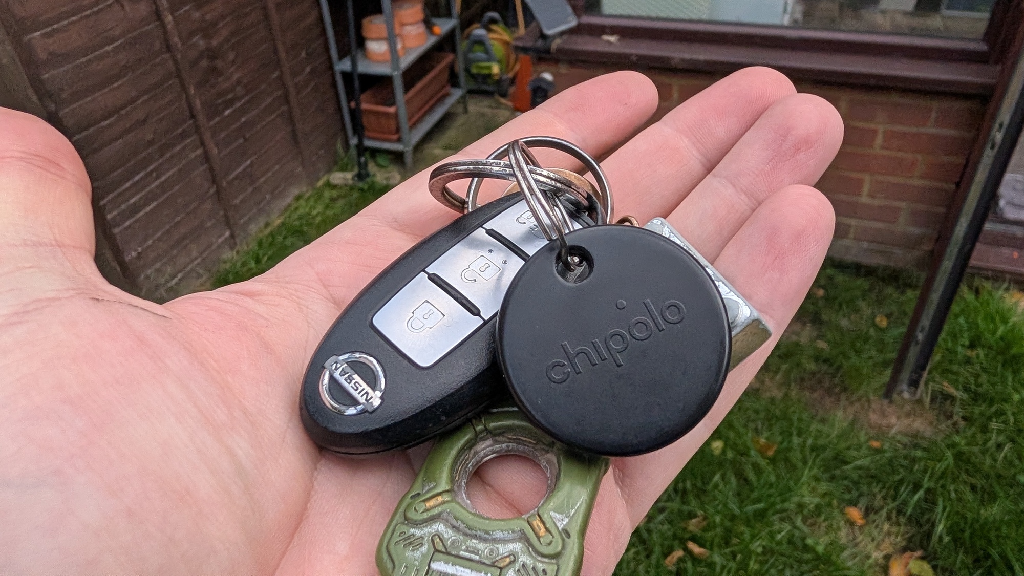 Chipolo Pop on keychain in hand