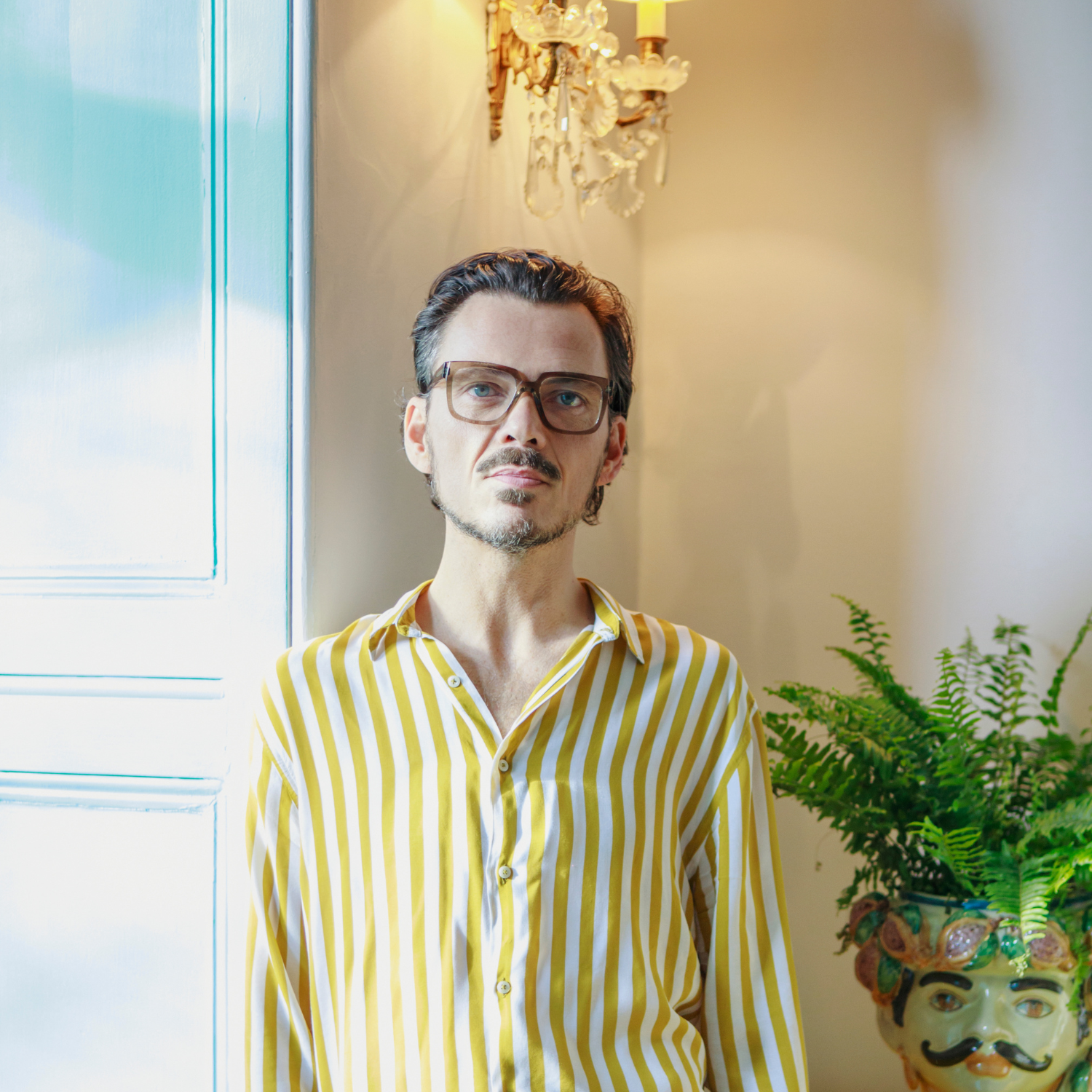 Matthew Williamson interior designer in yellow shirt