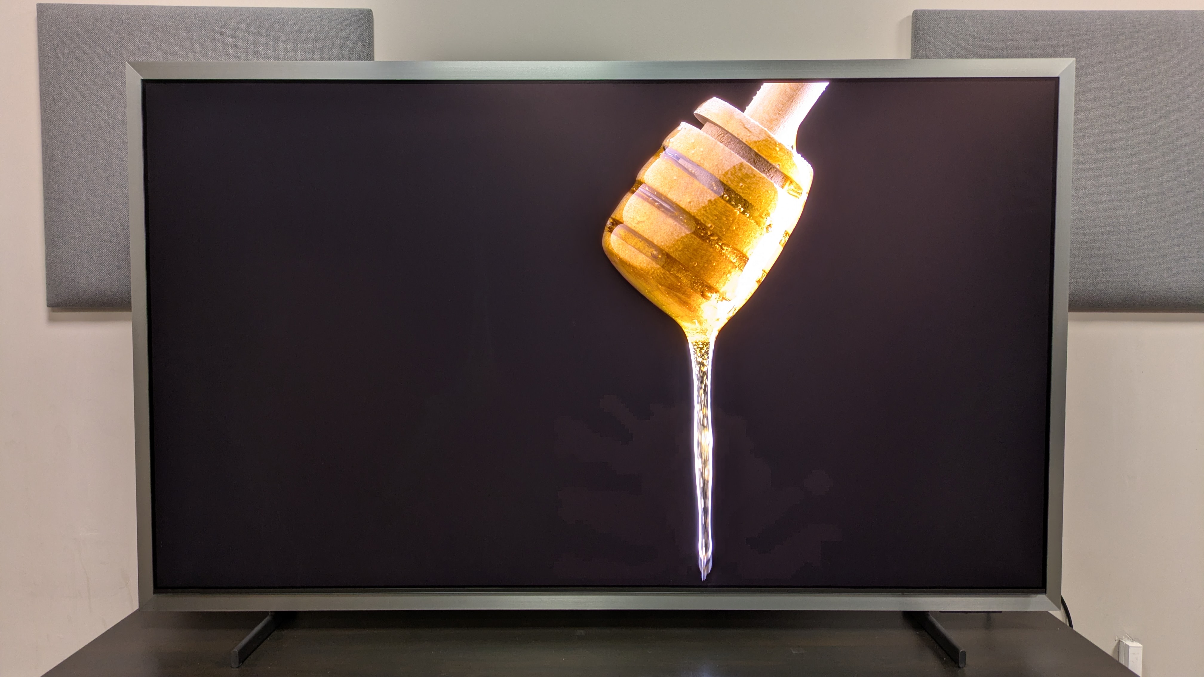 Samsung S99H with honey dripping on screen