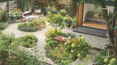 Beautifully landscaped garden with paving between circular flower beds and a copper water feature to support essential sensory garden ideas