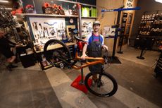 A Canyon bike being serviced at an REI shop