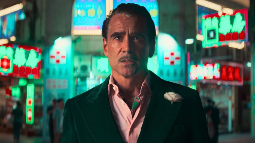 Colin Farrell stands in Macau looking up at street lights