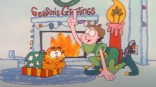 Garfield listens to Jon tell him about Christmas