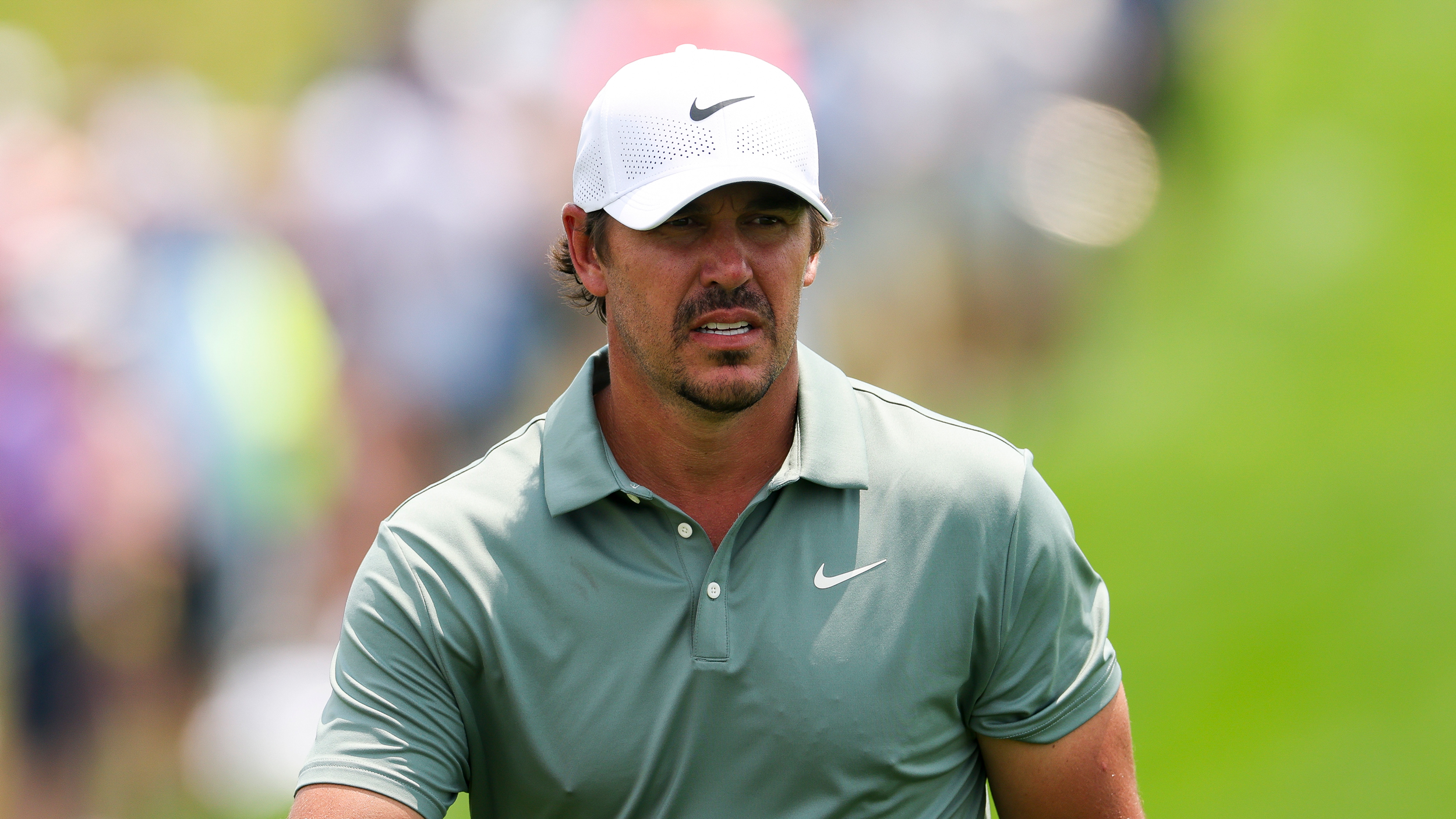 Brooks Koepka walks along during round one of the 2025 US Open at Oakmont