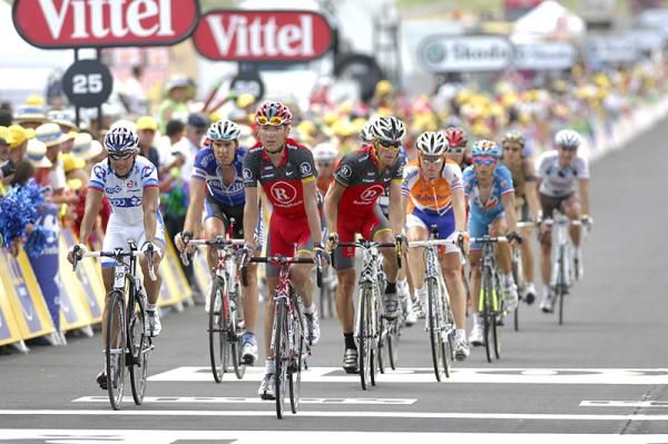 Janez Brajkovic (RadioShack) leads a group across the finish 3:35 down.