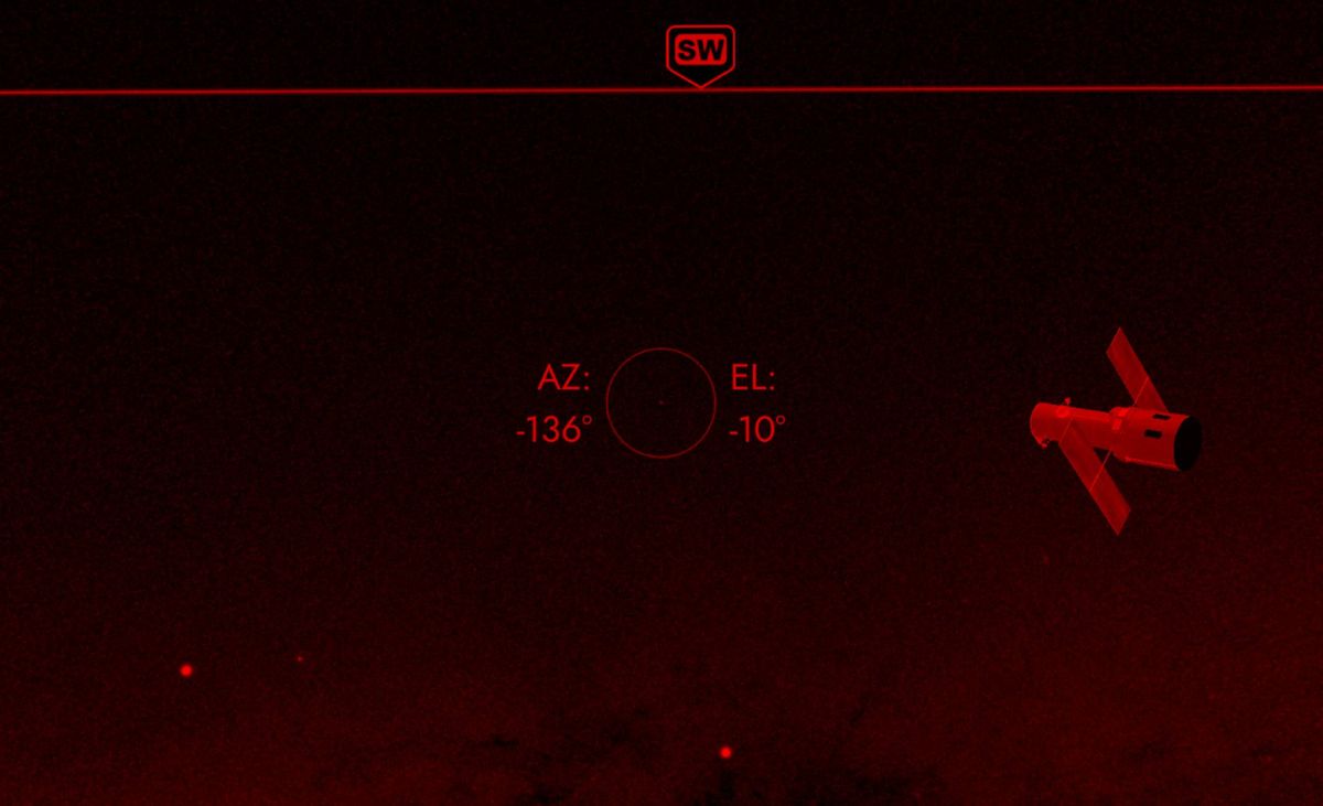 Aplicación SkyView en un teléfono móvil con filtro rojo.
