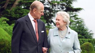 Queen Elizabeth II and her husband, the Duke of Edinburgh walk at Broadlands, Hampshire