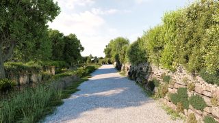 A gravelled driveway and boundary of the home has a hedge running along the outside of the property's edge