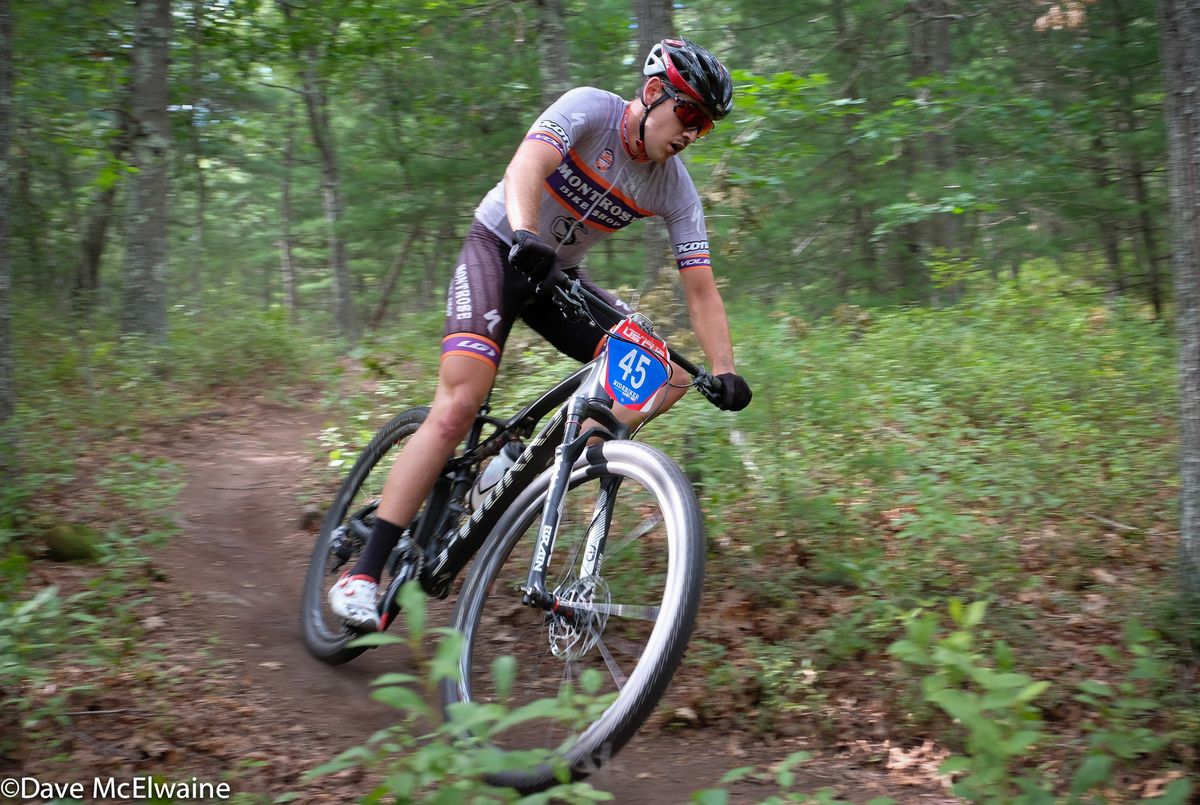 Lucas Rowton (Montrose Bike) riding buff singletrack during lap three