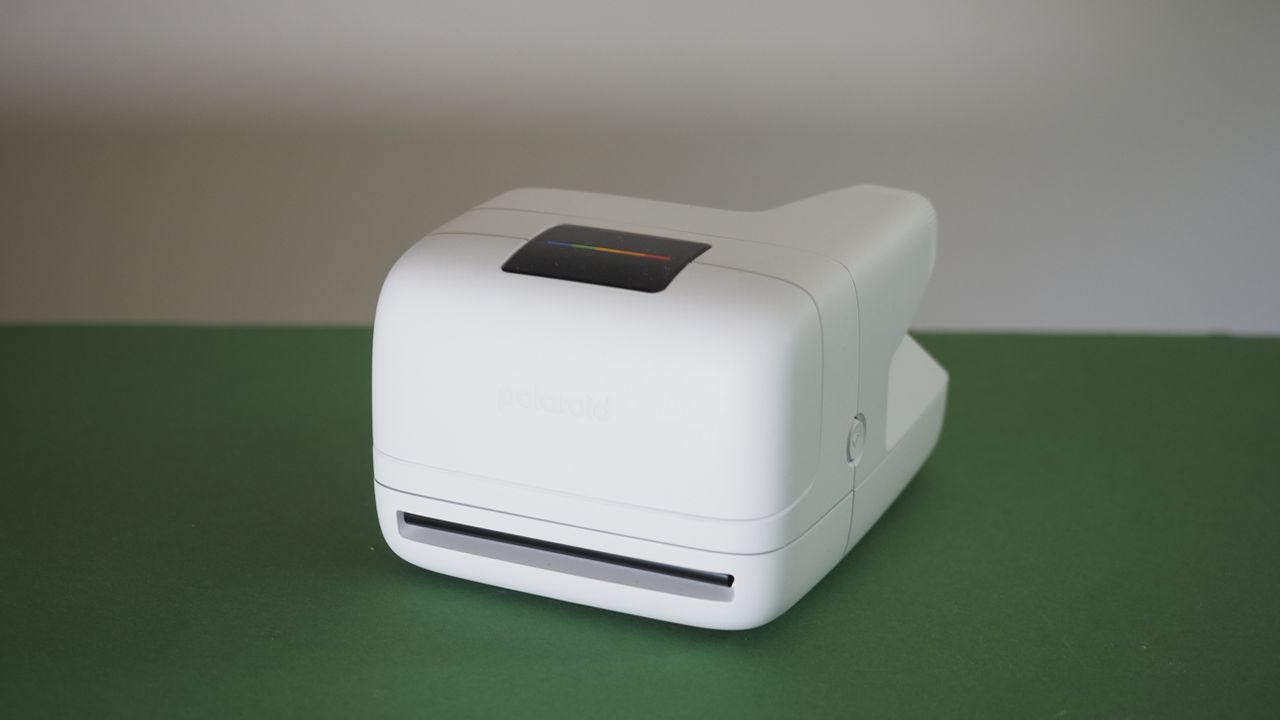 Polaroid Flip camera on a green surface