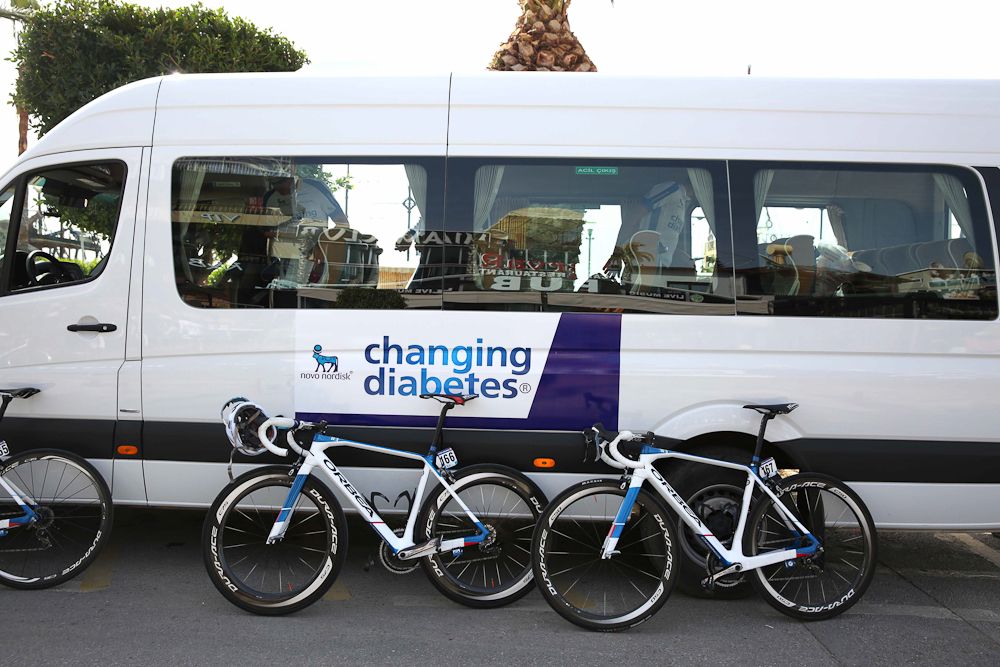 The Novo Nordisk bus waits for the riders.