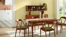 A modern yellow dining room