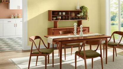 A modern yellow dining room