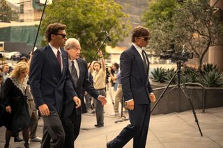 Cooper Koch as Erik Menendez, Jeff Perry as Peter Hoffman, Nicholas Chavez as Lyle Menendez in episode 201 of Monsters: The Lyle And Erik Menendez Story.