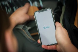 vinted logo on an iphone screen