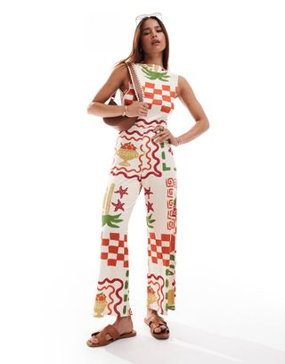 Asos Design Slash Neck Culotte Jumpsuit With Open Tie Back in Postcard Print