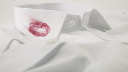 lipstick mark on white shirt collar - GettyImages-518979744