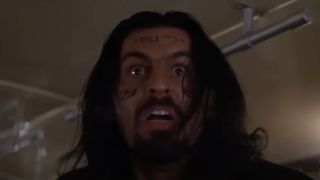 Oded Fehr looks up with concern in The Mummy.