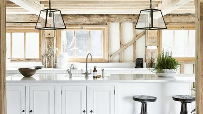 Prep sinks kitchen trend in a country-style kitchen with wooden beams