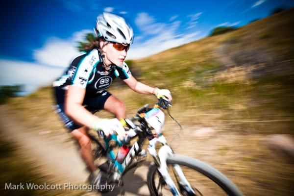 A woman zooms past at the inaugural Beti Bike Bash