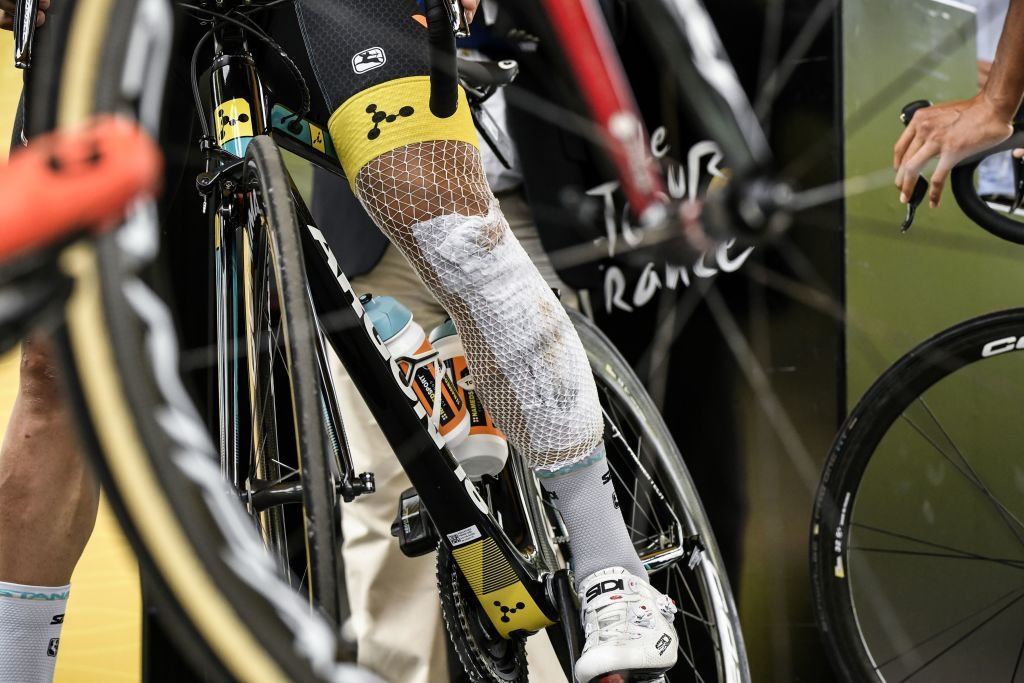 Alexey Lutsenko has some bandages after his stage 9 crash