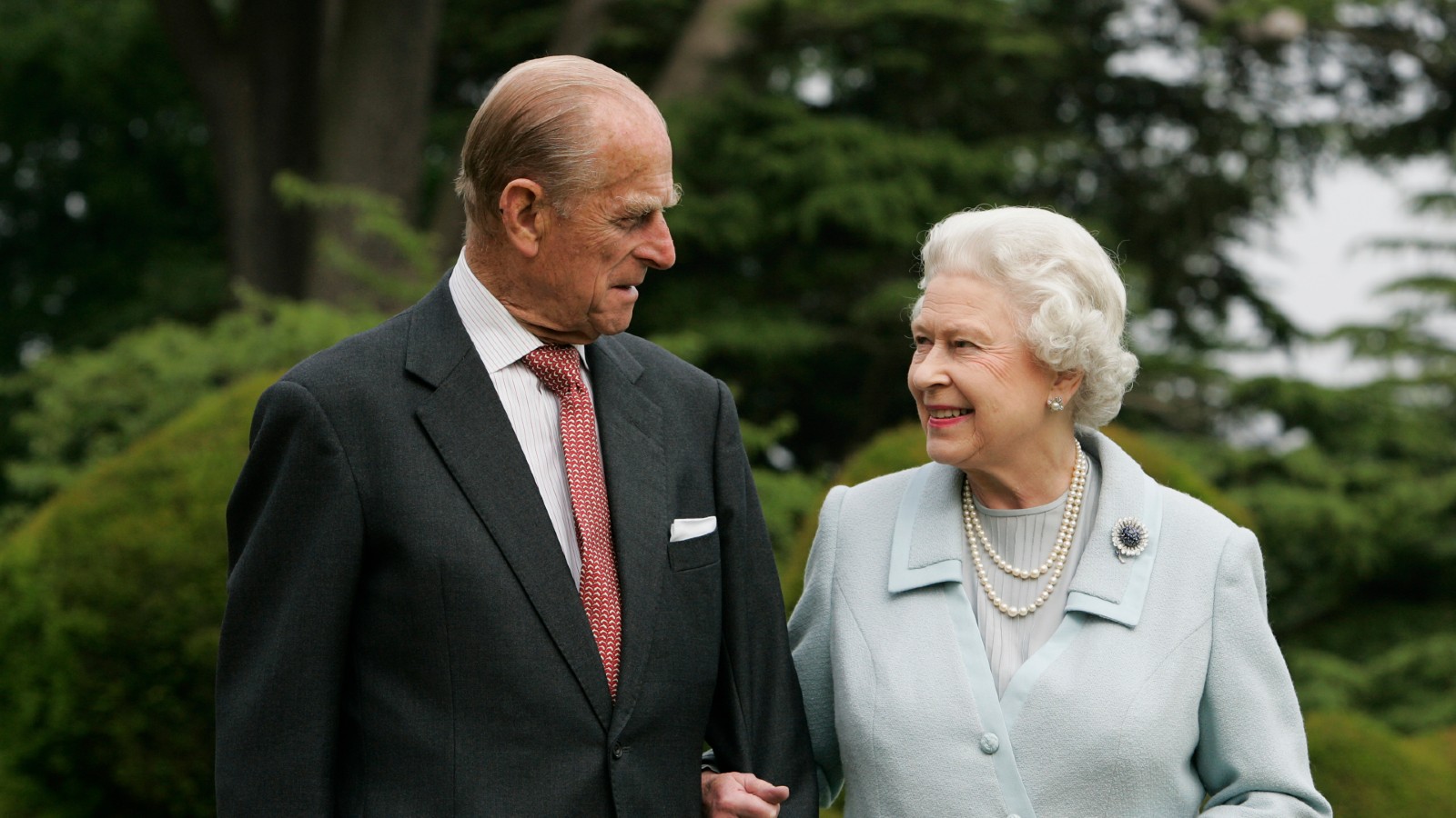 The real story behind that iconic photo of The Queen and Prince Philip  laughing | Woman &amp; Home |