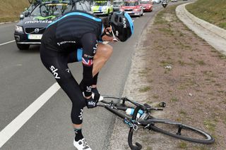 Geraint Thomas pulls on his leg warmers on stage one of the 2015 Paris-Nice. Photo: Graham Watson