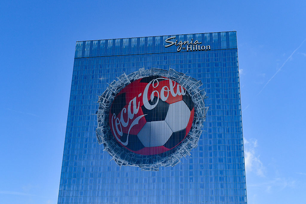 ATLANTA, GA - JUNE 15: An image of a Coca-Cola soccer ball breaking through the Hilton hotel located beside Atlanta Stadium during the FIFA World Cup 2026 Group H match between Spain and Cape Verde on June 15th, 2026 at Atlanta Stadium in Atlanta, GA. (Photo by Rich von Biberstein/Icon Sportswire via Getty Images)