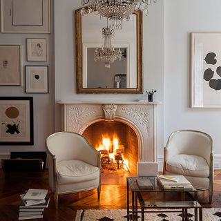 living room with fireplace and white wall