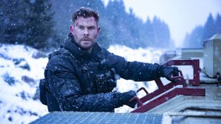 Chris Hemsworth as Tyler Rake in the snow in Extraction 2