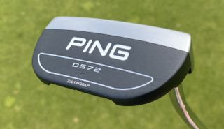 Ping 2022 DS72 Armlock Putter on a green background