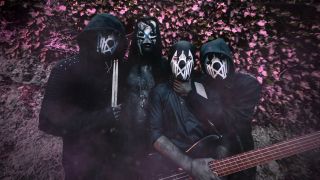 Sleep Broken, dressed as Sleep Token, looking at the camera