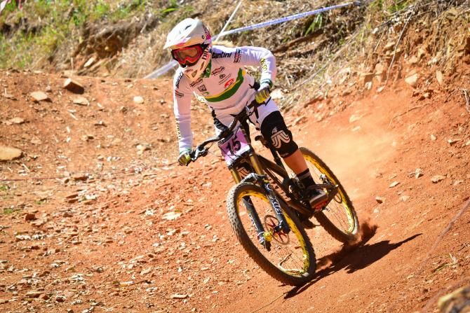 Australia's Tracey Hannah overcame her broken collar bone of seven weeks ago to claim the bronze medal in the elite women's downhill