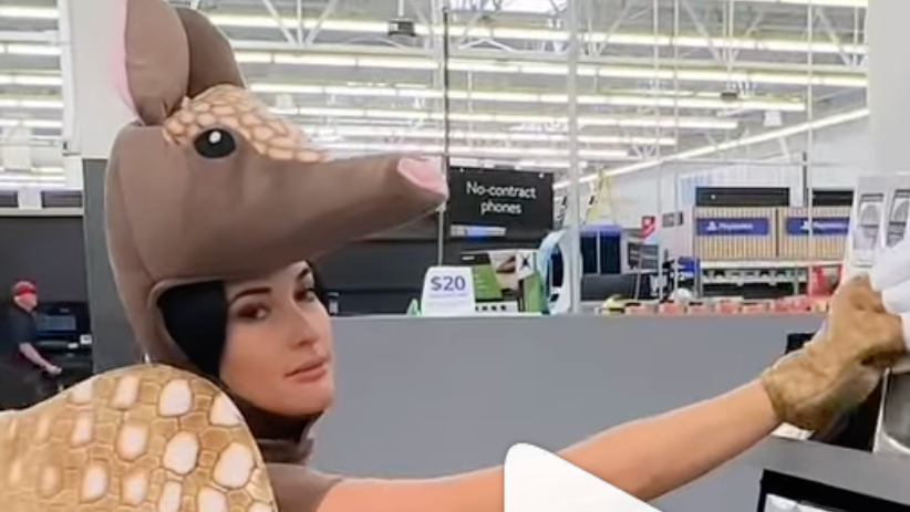 Kacey Musgraves shopping in an armadillo costume