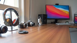 A photo of the Brodan L-shaped standing desk in a home office