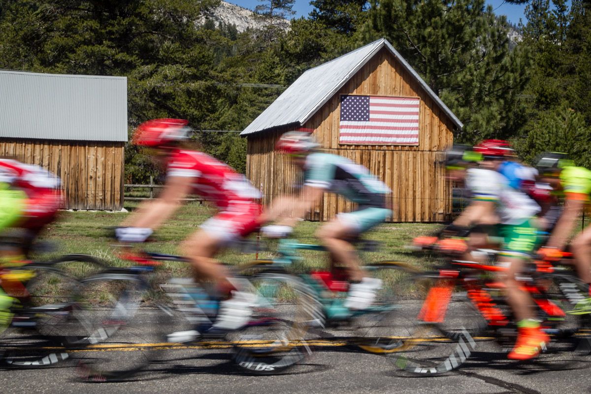 Riders pass by a farm along todays course.
