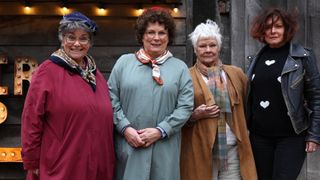 In this image released on March 15, 2022, Dame Judy Dench and Finty Williams with Dawn French and Jennifer Saunders during the Repair Shop special for Comic Relief's Red Nose Day 2022 on February 23,2022 in London,England. The Repair Shop welcomes some very special guests into the barn. Desperate to get on TV and to meet Jay Blades, Dawn French and Jennifer Saunders reprise their characters "The Extras" to blag a free fix from the team. Starring some surprise extra special guests.