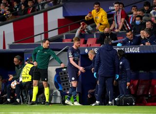 Kevin De Bruyne, centre, was forced out of Wednesdya night's Champiopns League tie in Madrid in the 65th minute