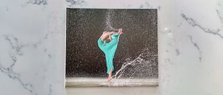 The front cover of a Blurb photo book on a countertop surface