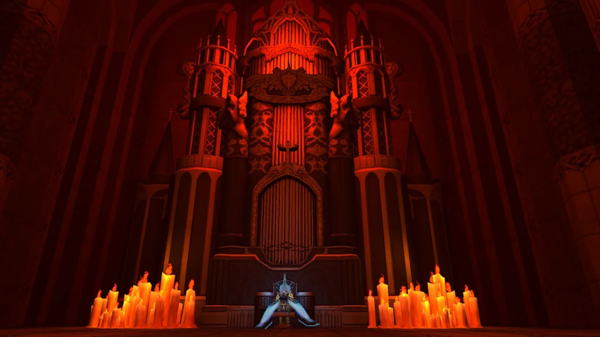 A red-lit alter with dozens of lit candles on the floor before it