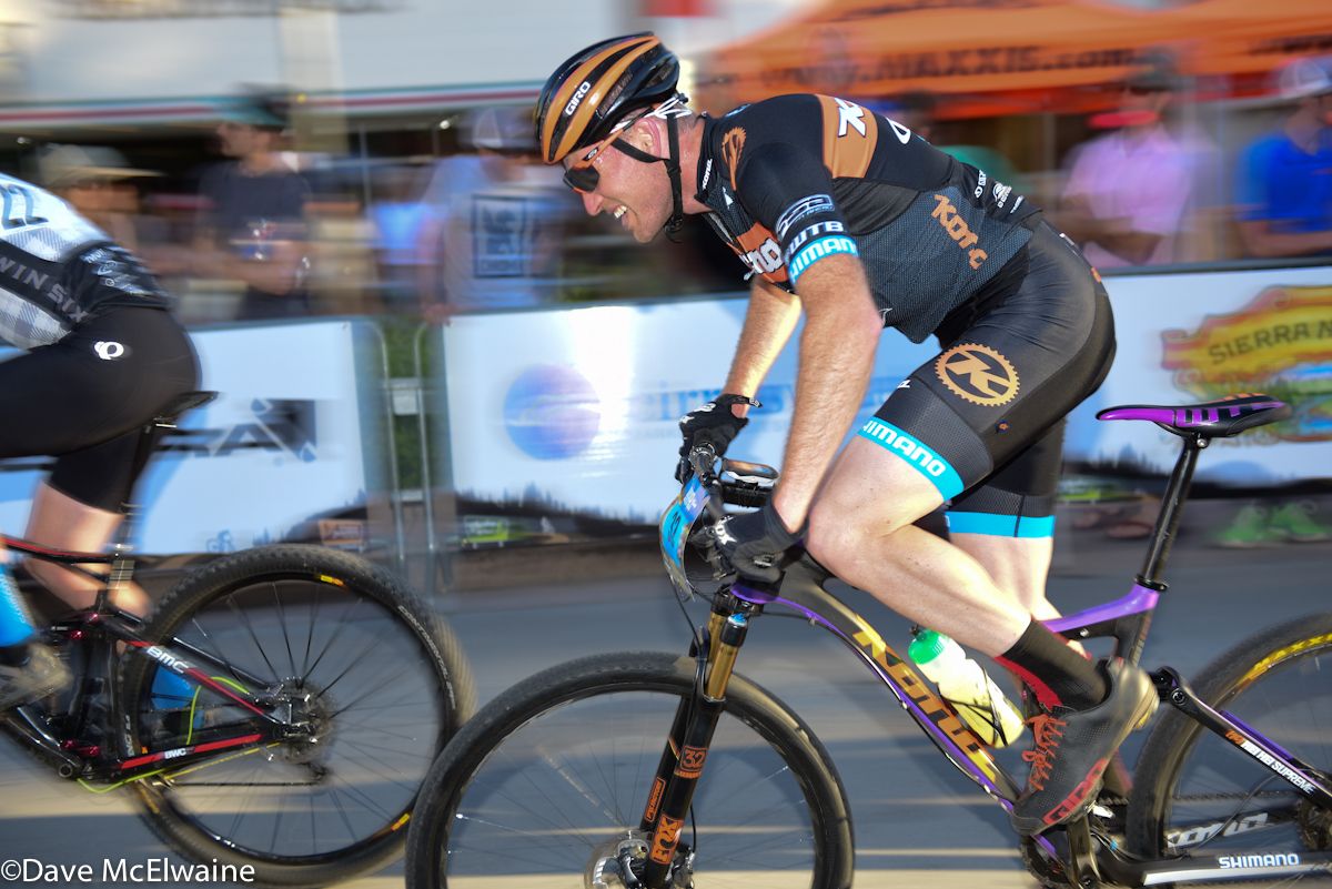 Kris Sneddon (Kona) accelerating out of a corner with two laps to go