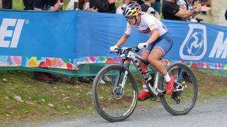 Evie racing XCC at the 2023 UCI World Championships at Glentress