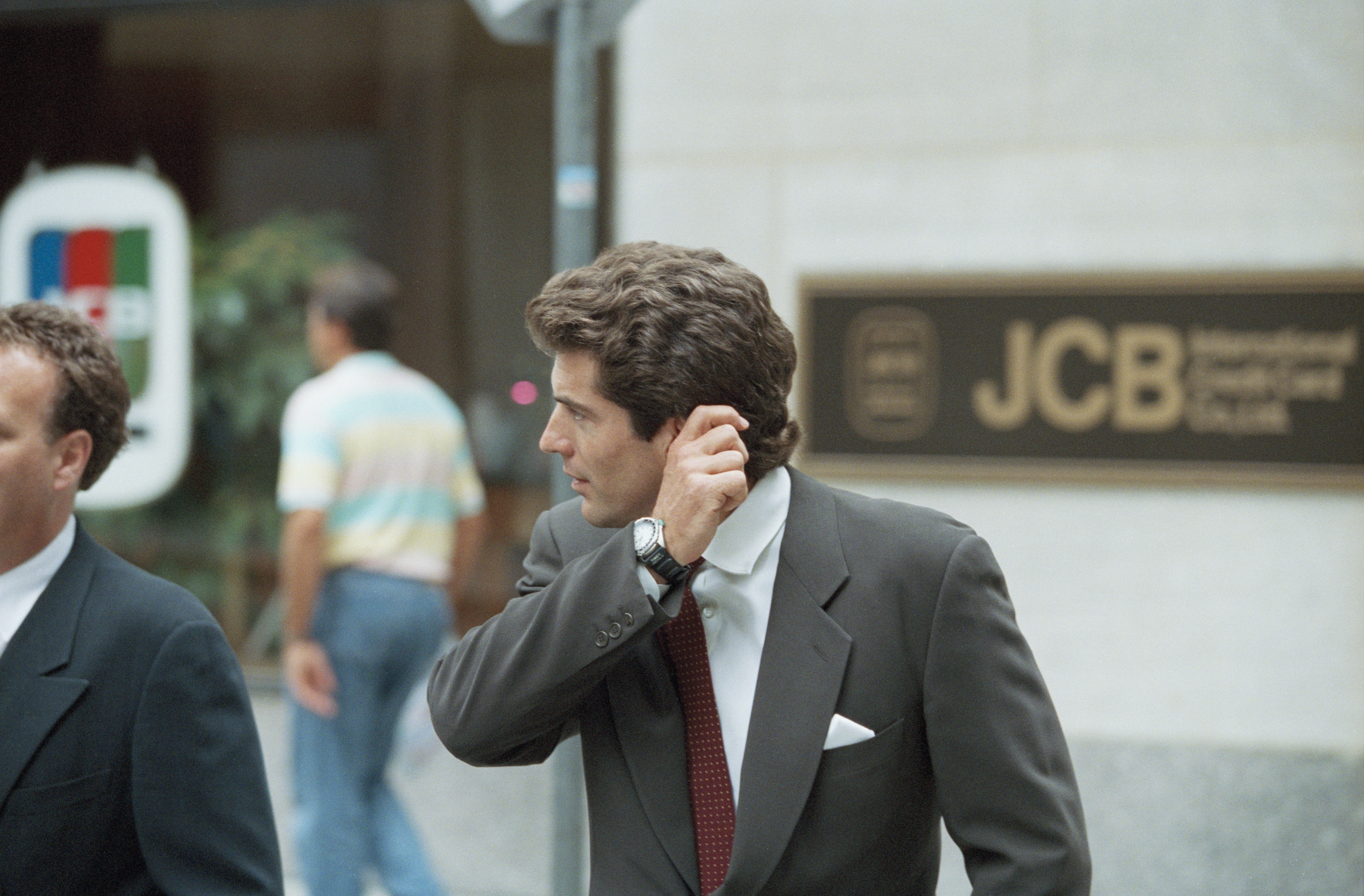 John Kennedy Junior Leaves the mid-town Manhattan offices of his magazine 'George'