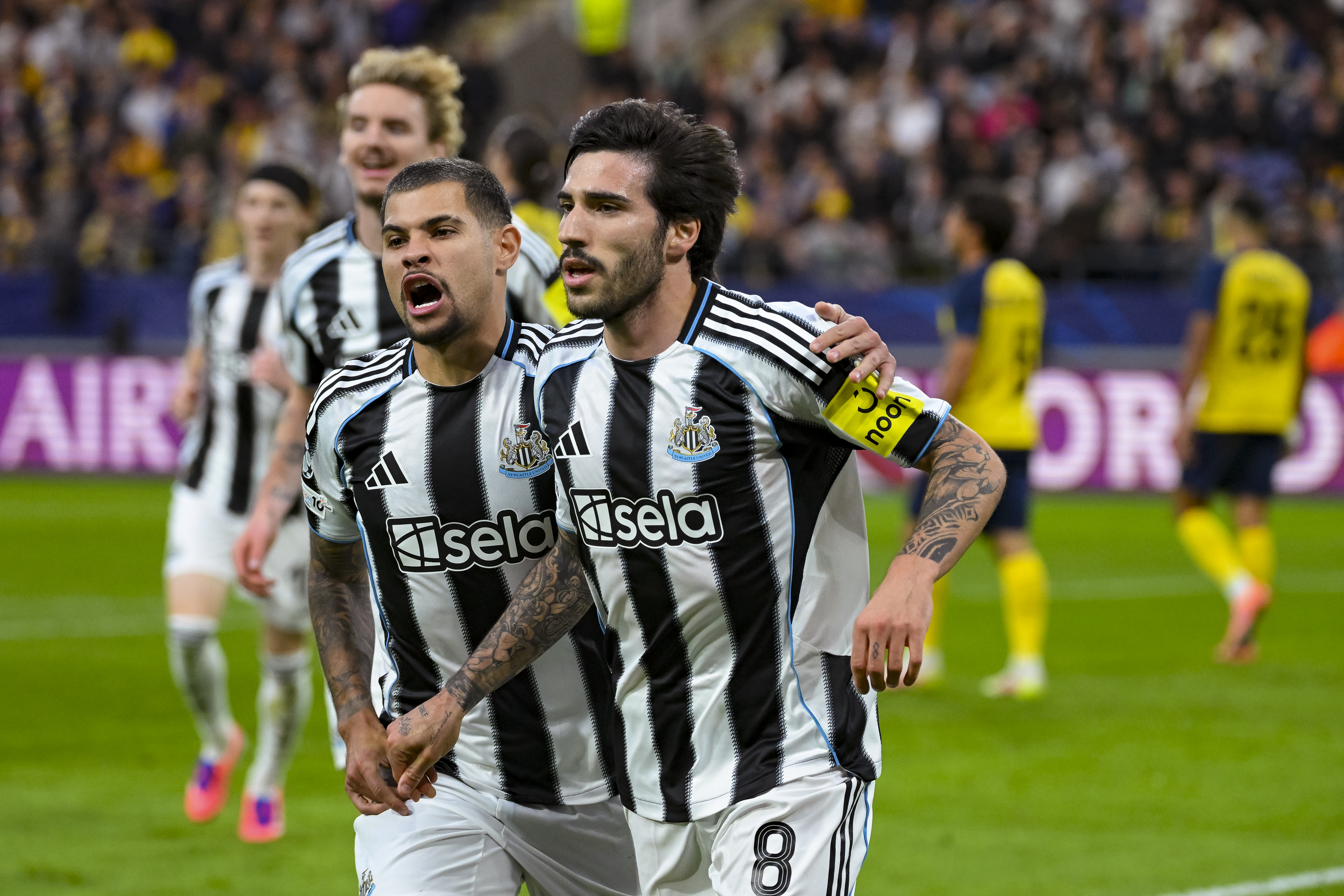 Sandro Tonali and Bruno Guimaraes celebrate Newcastle&#039;s opener on the night